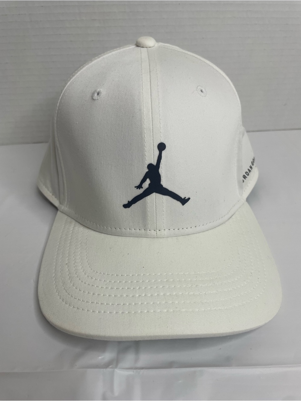 White Jordan Golf Dri-Fit adjustable SnapBack Cap with Black Jumpman Logo